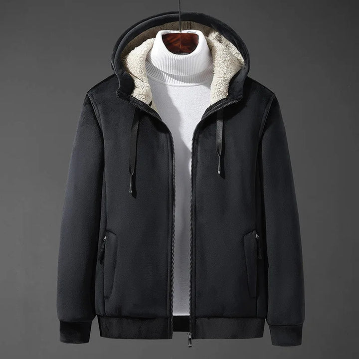 Black jacket with fur-lined hood on a mannequin against a gray background