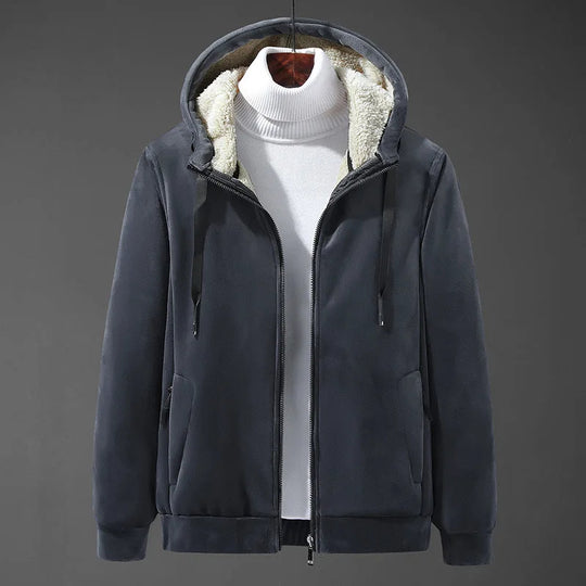 Dark gray hoodie with white fleece lining on a gray background