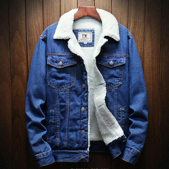 A blue denim jacket with a white collar and a wool-lined hood, displayed on a wooden hanger.
